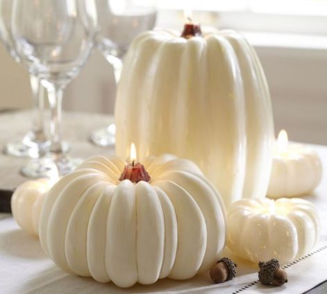 interior-decoration-with-white-candles-pumpkins.jpg